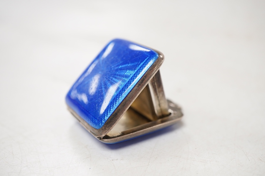 A George V silver and blue guilloche enamel travelling folding timepiece, maker SSM, Birmingham, 1931, with Arabic dial and subsidiary seconds, case diameter 37mm, enamel a.f.